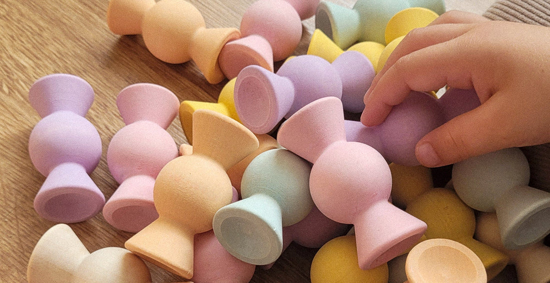 Chill Pepper Sweets in a stack with a child playing with them. Picture by @mrs_wolfling