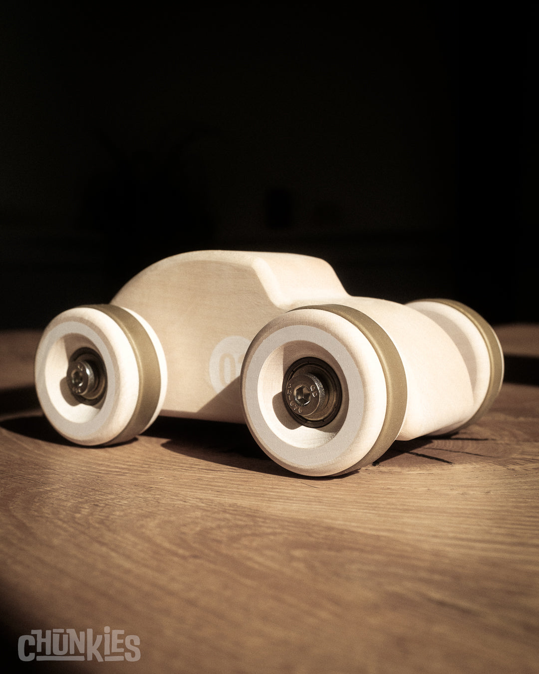 Chunkies: Natural wooden toy car in the shape of a vintage beetle car with wooden wheels, skate bearings and stainless steel hardware. Built to last generations. 