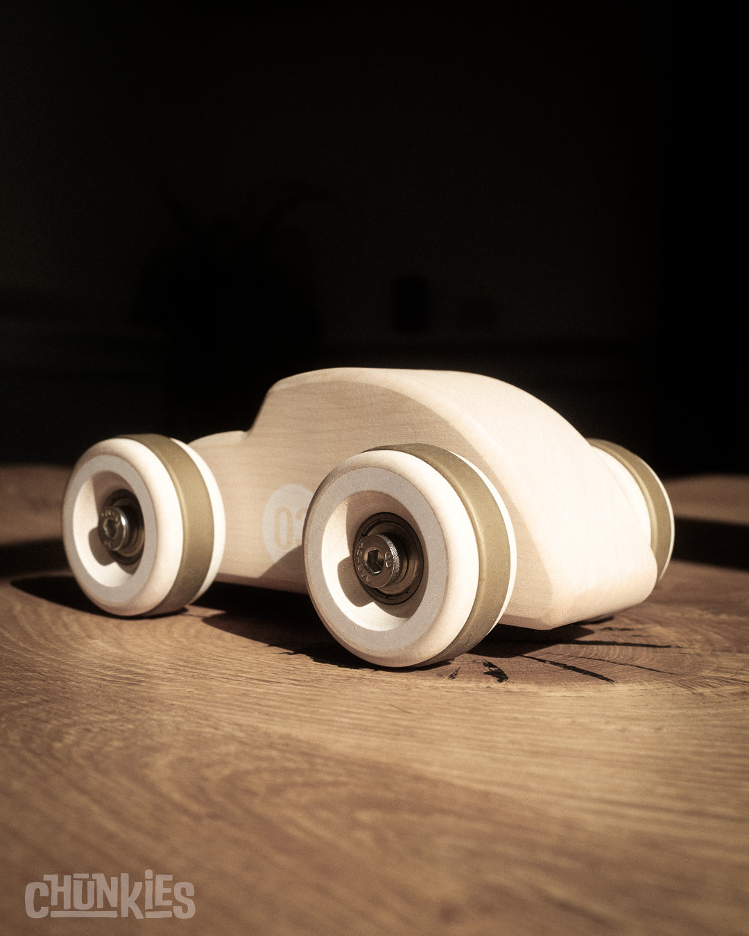 Chunkies: Natural wooden toy car in the shape of a vintage beetle car with wooden wheels, skate bearings and stainless steel hardware. Built to last generations. 