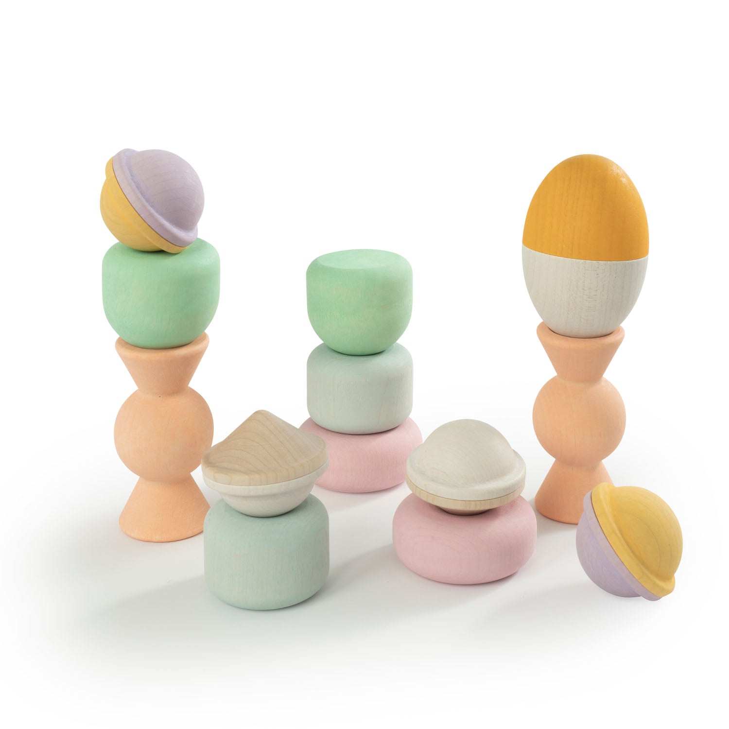 Wooden Chill Pepper Treats stacking and spinning game for ages 3 and up, made from eco-friendly maple wood and non-toxic, water-based paints. The set includes a variety of pastel-colored candy-shaped pieces and a unique Magic Egg for open-ended play.