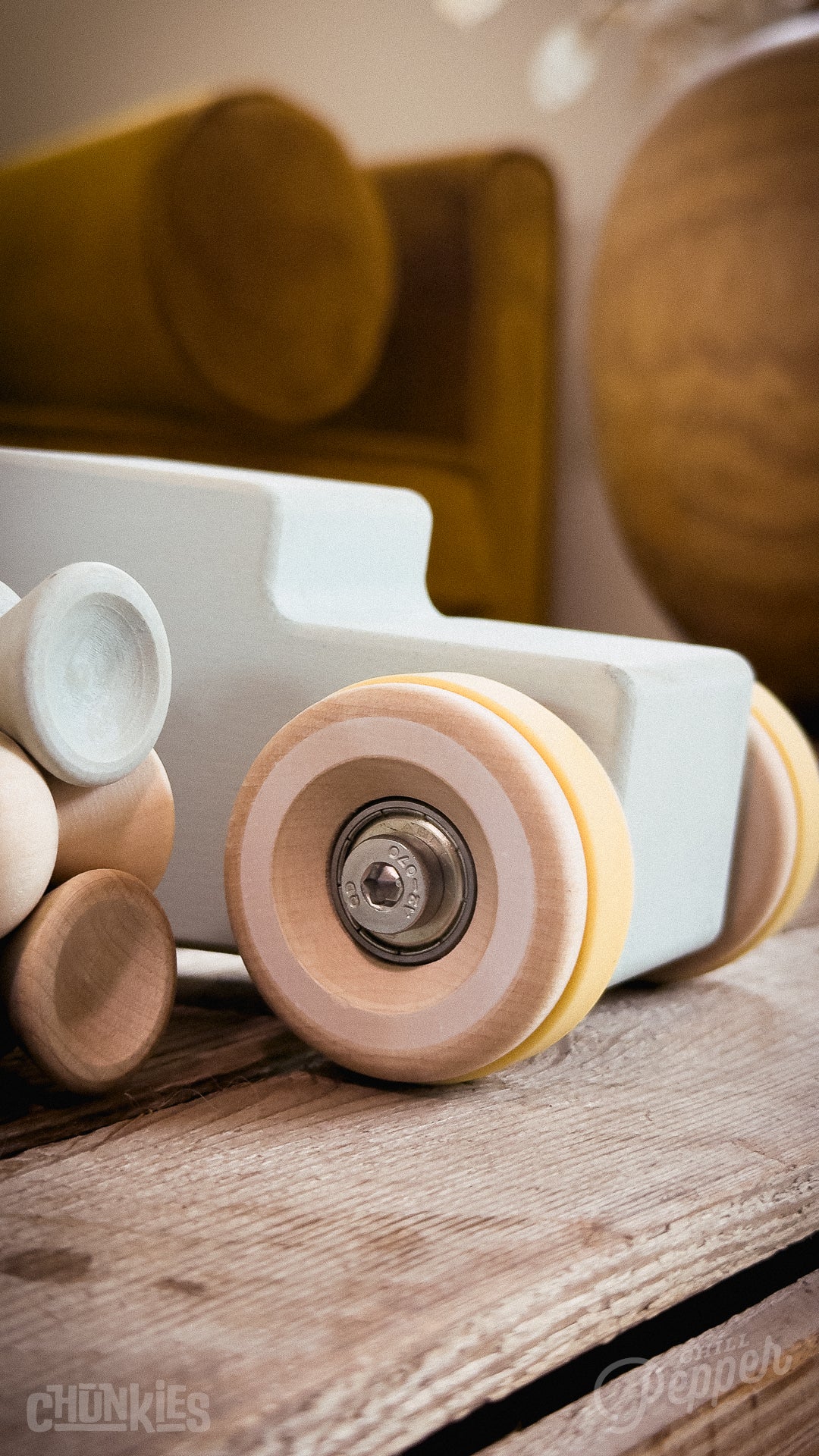 Chunkies: Light blue wooden toy car in the shape of a vintage pick-up truck with wooden wheels, skate bearings and stainless steel hardware. Built to last generations. 