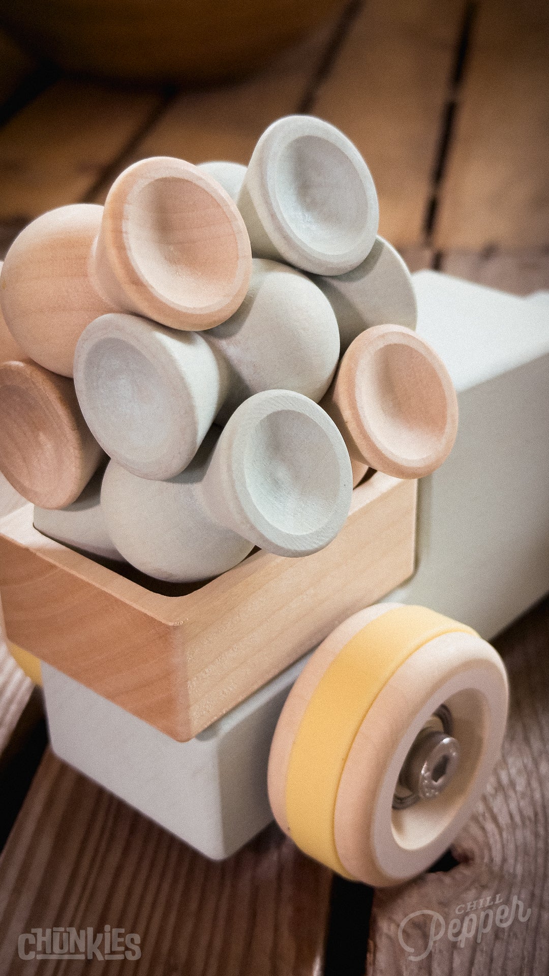 Chunkies: Light blue wooden toy car in the shape of a vintage pick-up truck with wooden wheels, skate bearings and stainless steel hardware. Built to last generations. 
