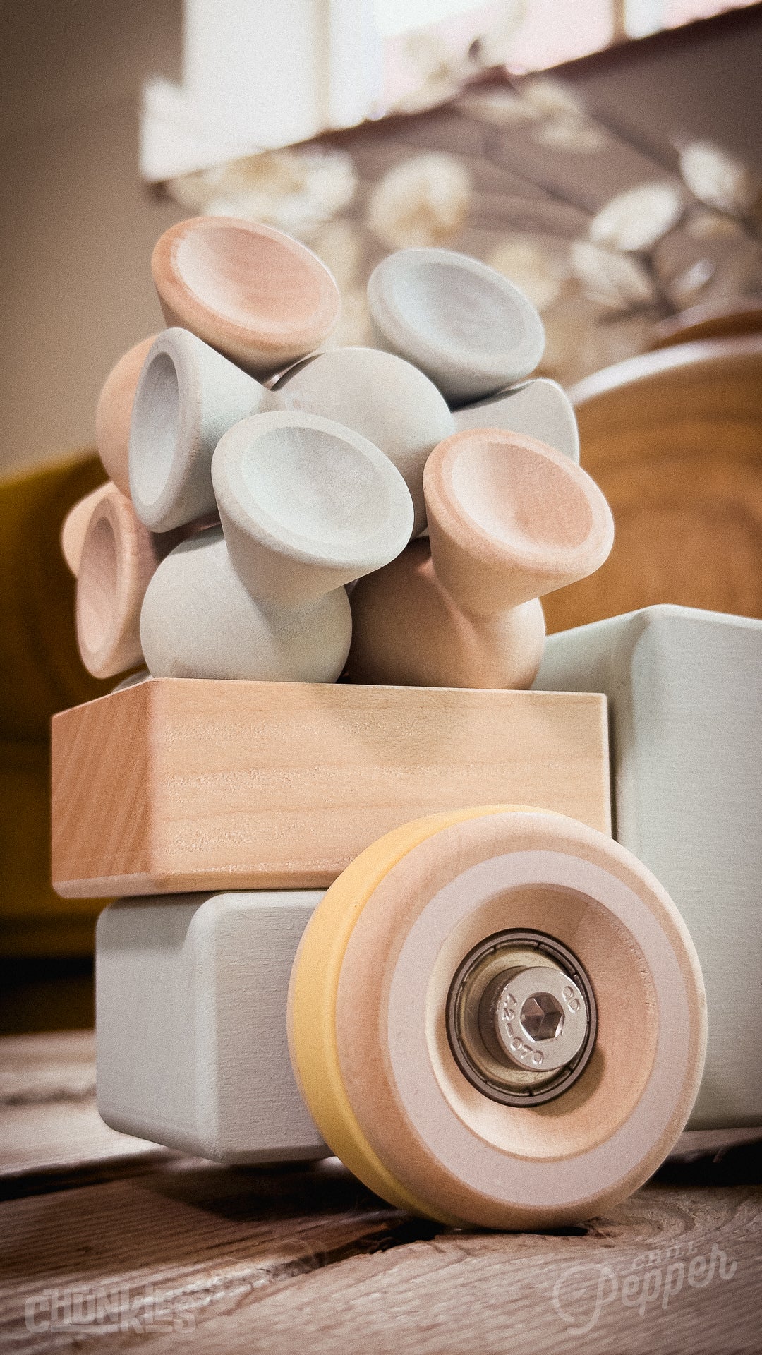 Chunkies: Light blue wooden toy car in the shape of a vintage pick-up truck with wooden wheels, skate bearings and stainless steel hardware. Built to last generations. 