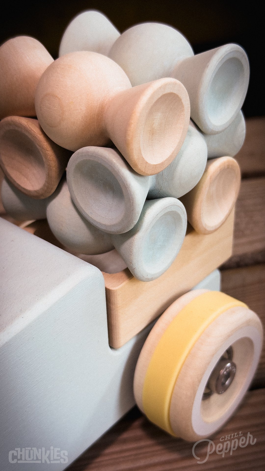 Chunkies: Light blue wooden toy car in the shape of a vintage pick-up truck with wooden wheels, skate bearings and stainless steel hardware. Built to last generations. 