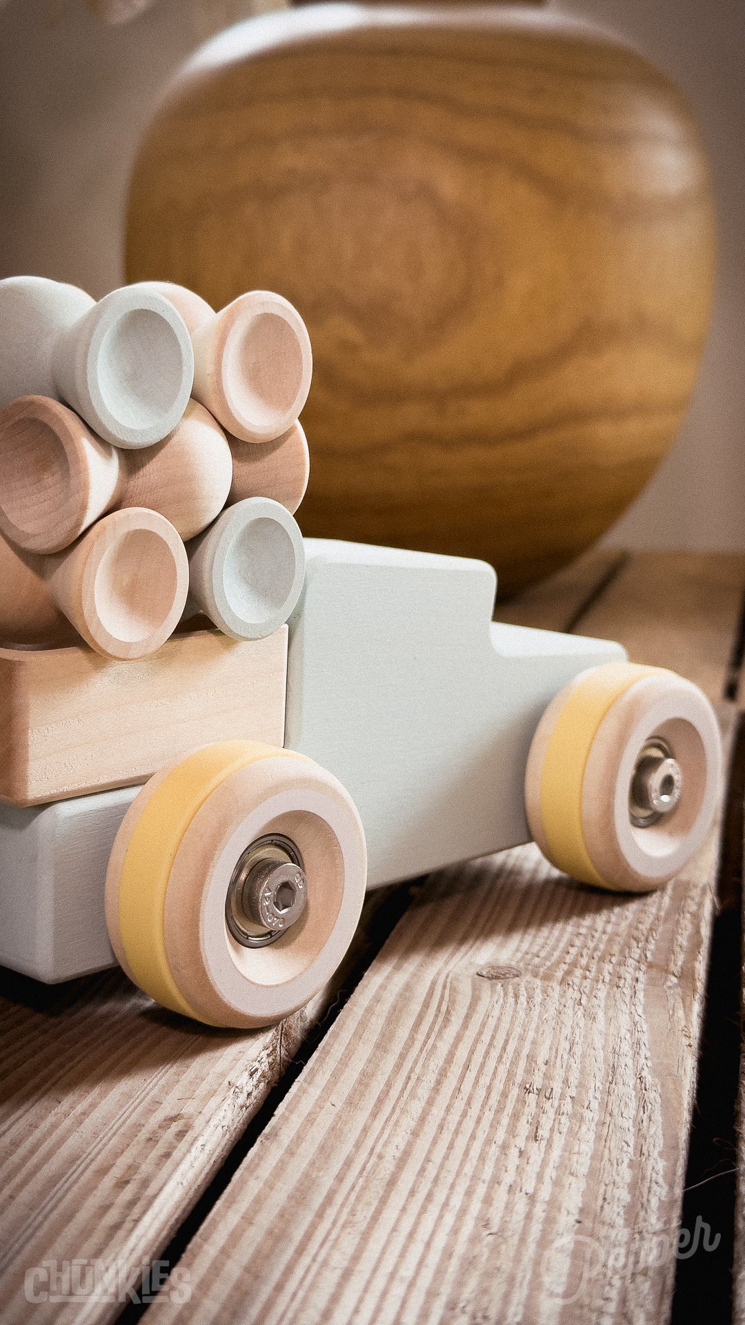 Chunkies: Light blue wooden toy car in the shape of a vintage pick-up truck with wooden wheels, skate bearings and stainless steel hardware. Built to last generations. 
