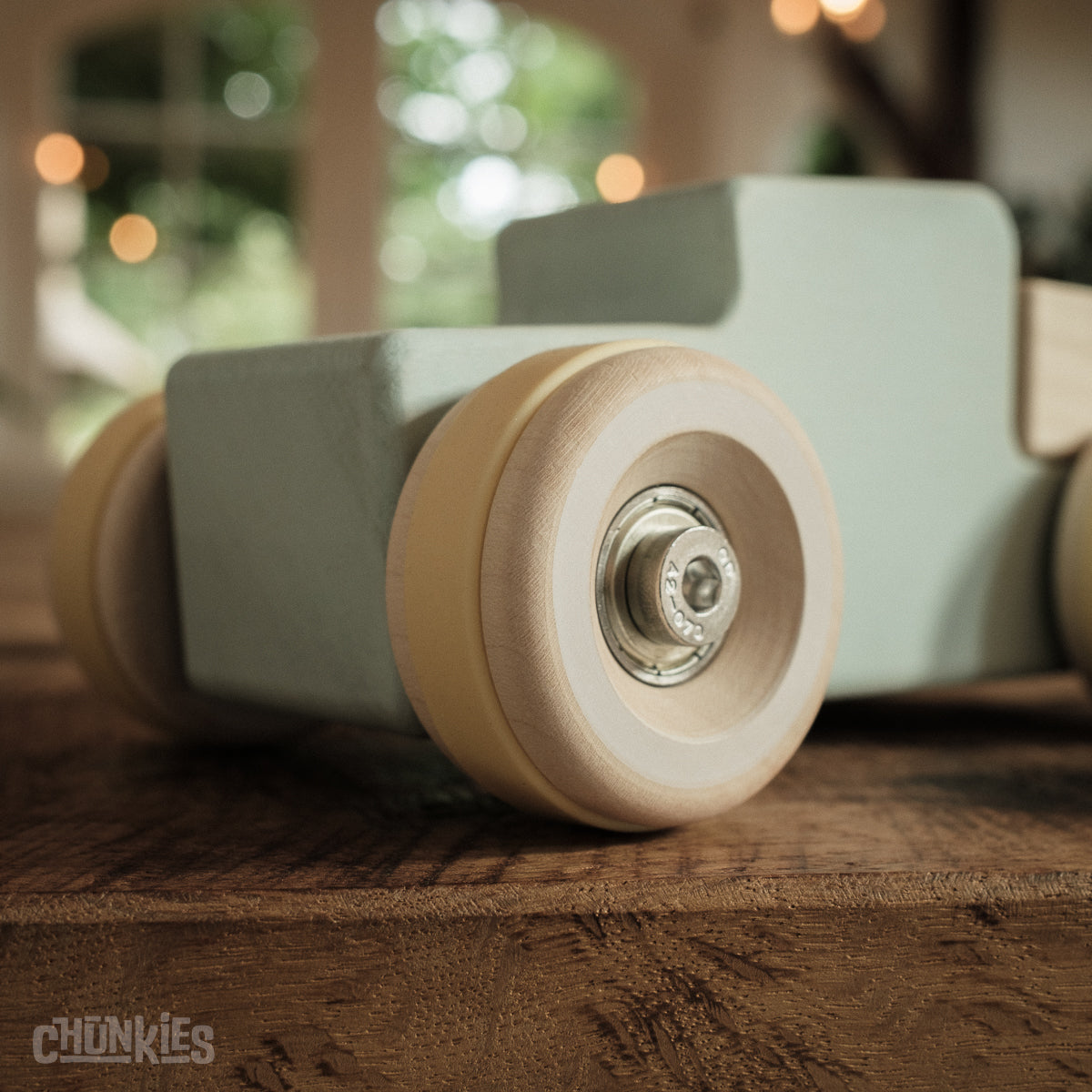 Chunkies: Light blue wooden toy car in the shape of a vintage pick-up truck with wooden wheels, skate bearings and stainless steel hardware. Built to last generations. 