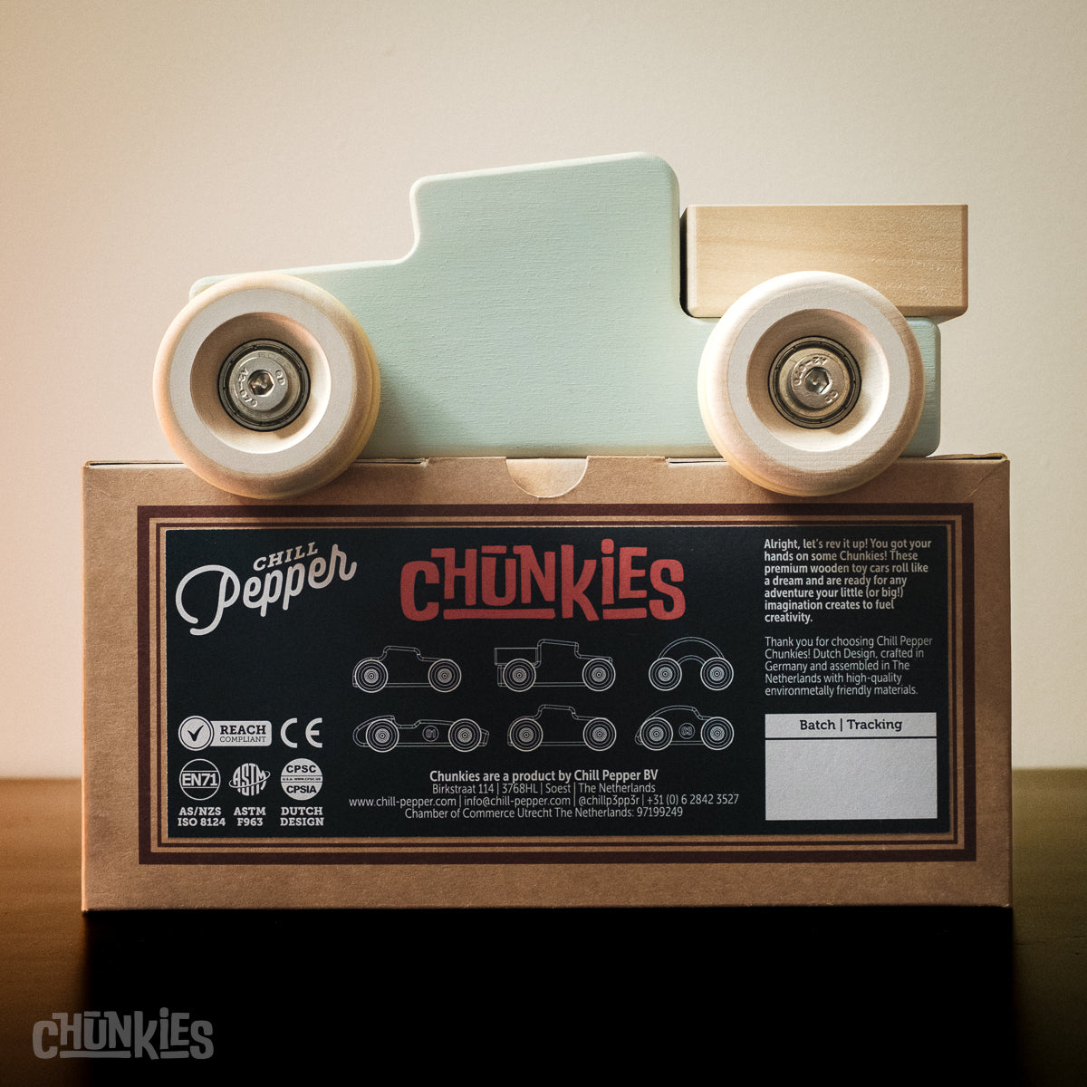 Chunkies: Light blue wooden toy car in the shape of a vintage pick-up truck with wooden wheels, skate bearings and stainless steel hardware. Built to last generations. 