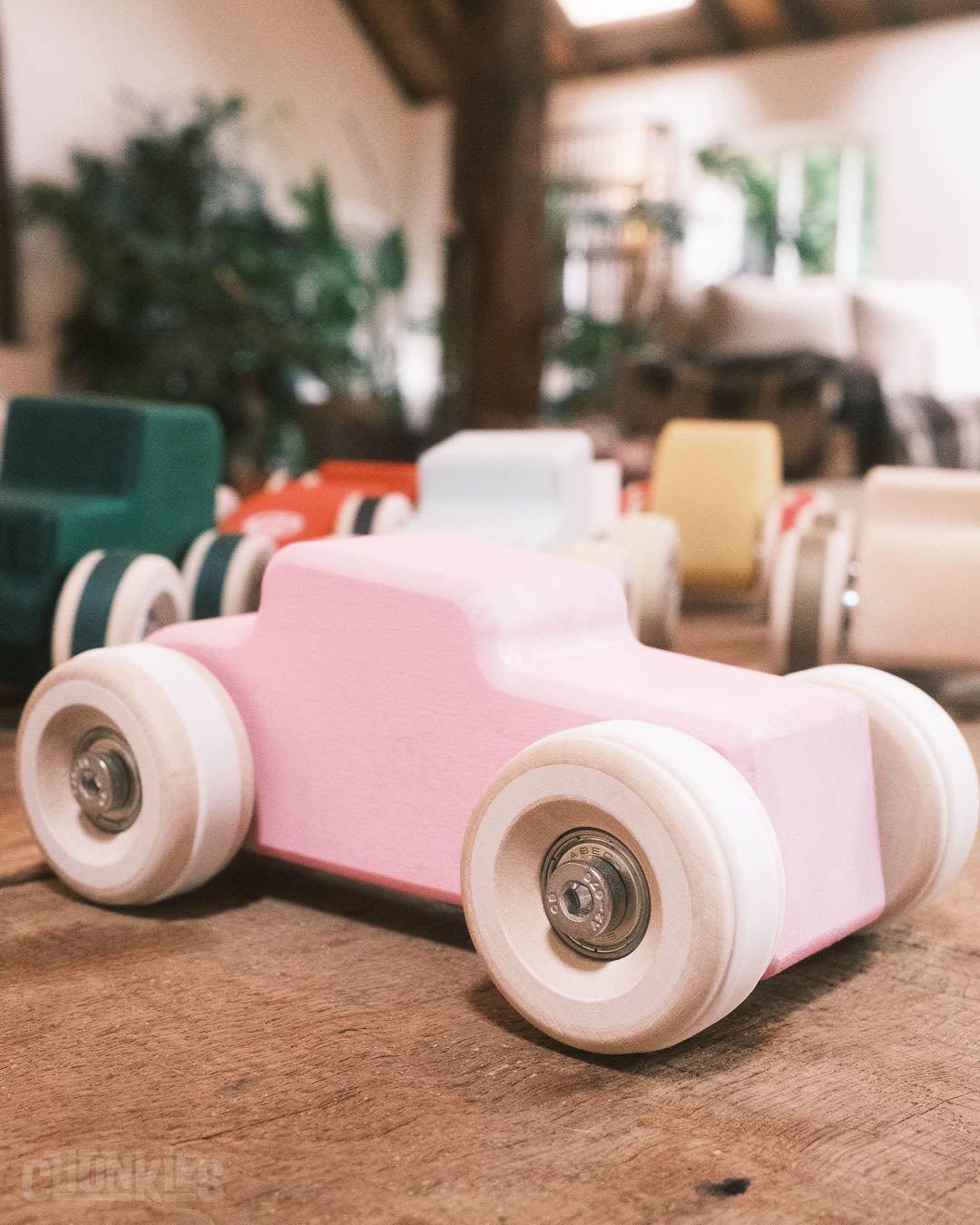Chill Pepper Chunkies No04  Wooden Toy Car The Hot Rod Perfectly Pink with its free extra white tires for customization.