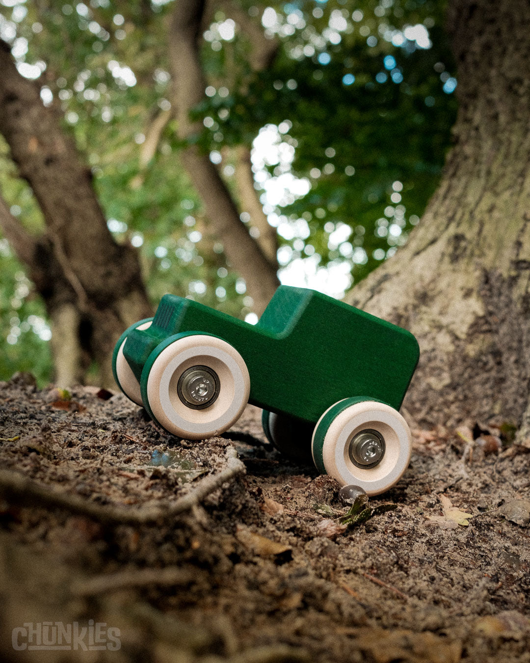 Chill Pepper Chunkies No05 Wooden Toy Car The Explorer All-Terrain in the forest. Its extra wheel clearance makes this big little car ready for any adventure. Imaginative play at its best. Made in Germany. Hand finished and assembled in The Netherlands