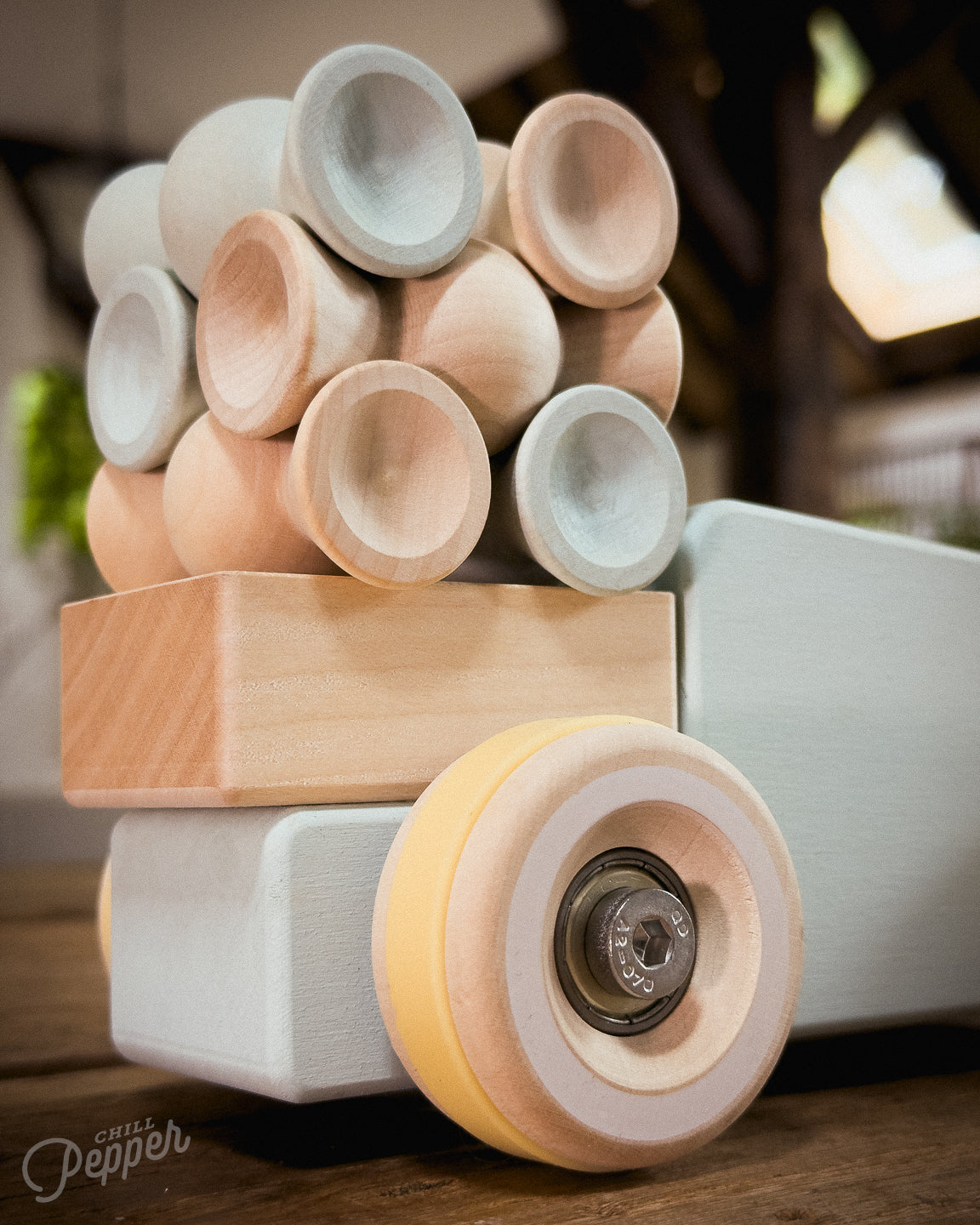 Chill Pepper Sweets wooden stacking game - A stack in the back of the Chunkies Pick-Up wooden toy car