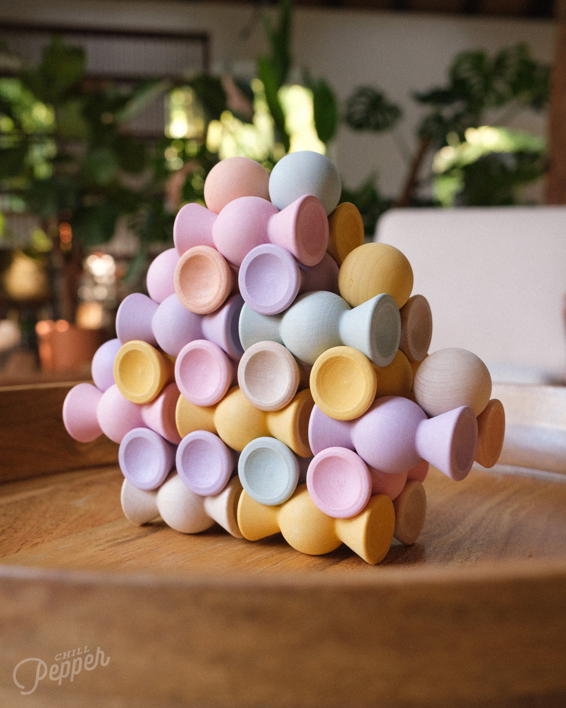 Colorfull stack of Chill Pepper Sweets Wooden Stacking game -  in the shape of a mountain