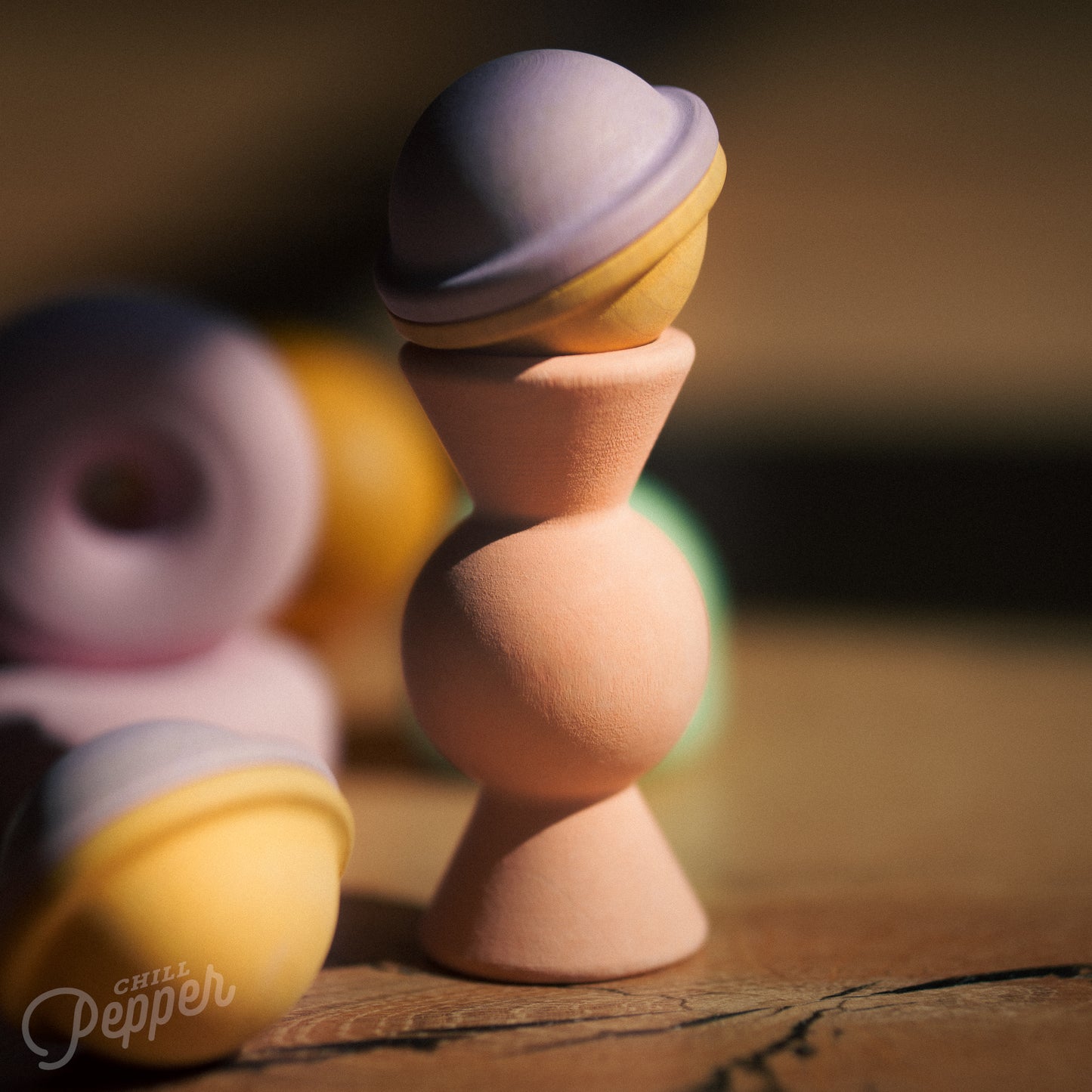 Wooden Chill Pepper Treats stacking and spinning game for ages 3 and up, made from eco-friendly maple wood and non-toxic, water-based paints. The set includes a variety of pastel-colored candy-shaped pieces and a unique Magic Egg for open-ended play.