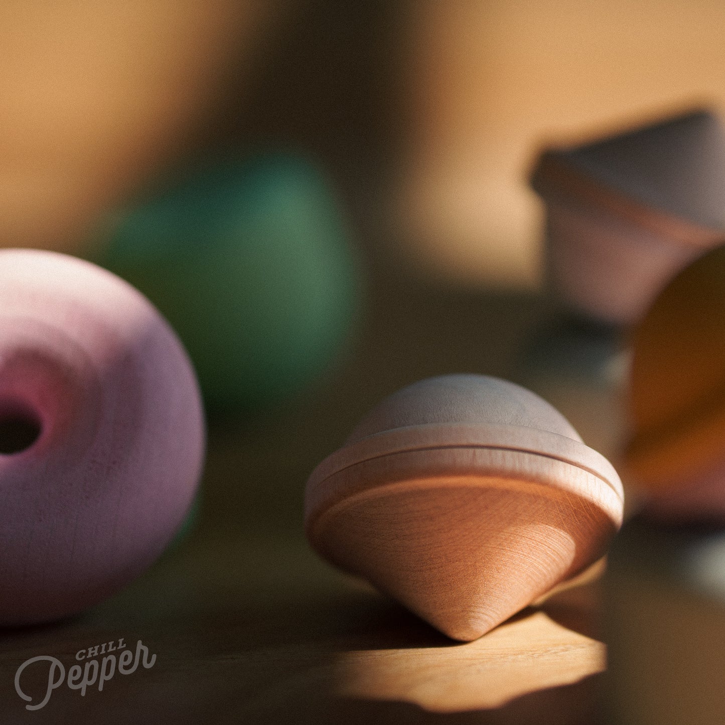 Wooden Chill Pepper Treats stacking and spinning game for ages 3 and up, made from eco-friendly maple wood and non-toxic, water-based paints. The set includes a variety of pastel-colored candy-shaped pieces and a unique Magic Egg for open-ended play.
