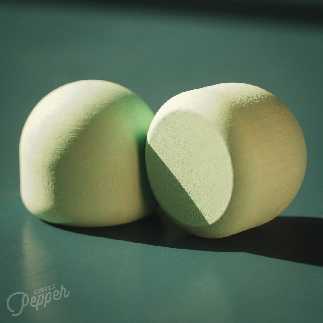 Chill Pepper Treats – Wooden Stacking & Spinning Game - The marshmallows in soft pastel mint green are great for stacking but also can also surprise you when you spin them. Spin them hard enough and see what happens