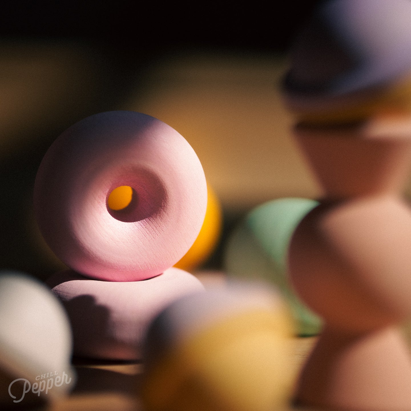 Chill Pepper Treats – Wooden Stacking & Spinning Game - close-up of the donut in the bunch