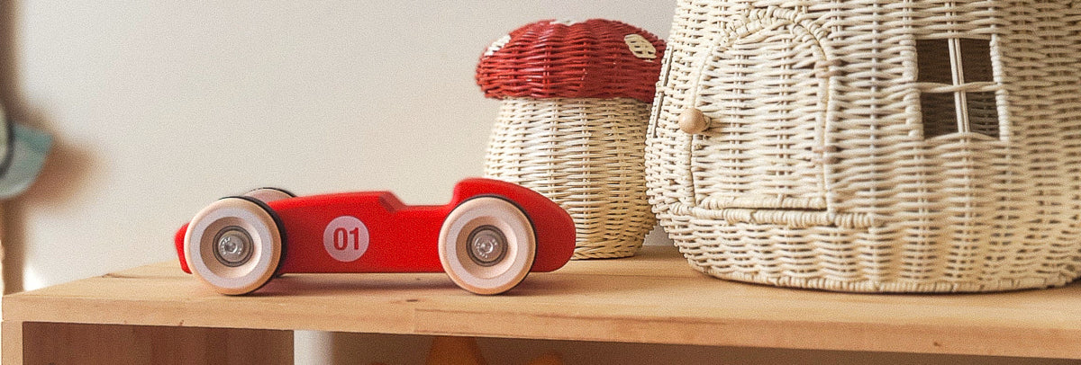 Red Chill Pepper Chunkies wooden race car in a stylish interior stimulating creative play
